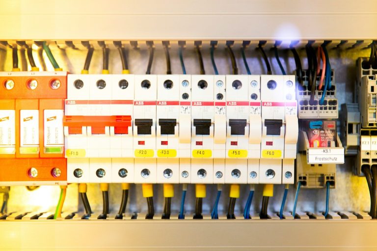 Circuit breakers and wiring inside an electrical control cabinet