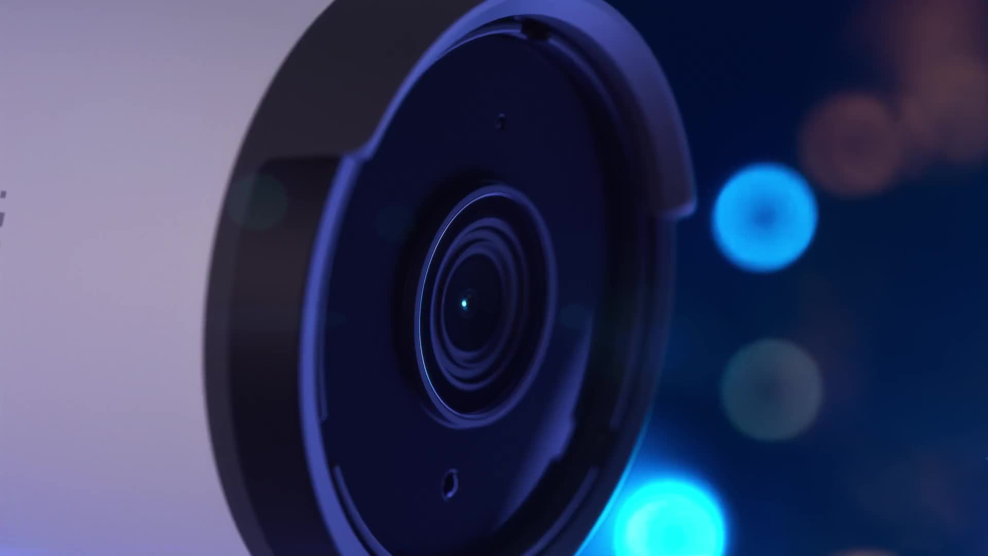Close-up of a UniFi security camera under blue lighting
